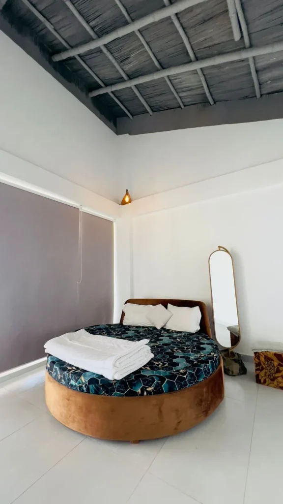 interior of executive room with comfortable bed and privacy wall off