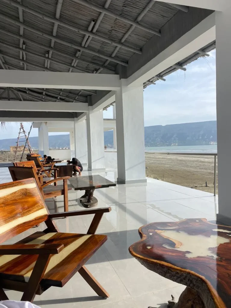 Stunning view of 2nd floor of gidan beach resort. outdoor seatings of executive rooms, clean beach and stunning mountains of ormara balochistan